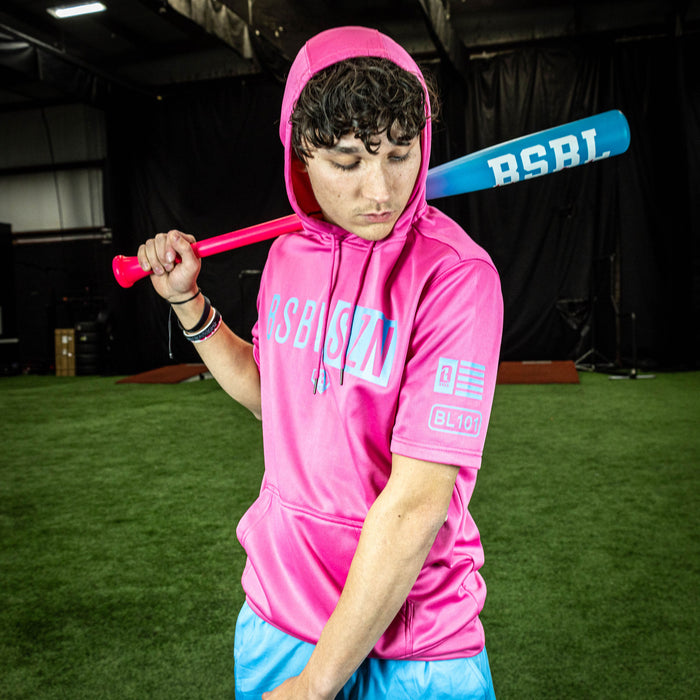Adult model wearing pink BSBL-SZN Cotton Candy Pink short sleeve hoodie