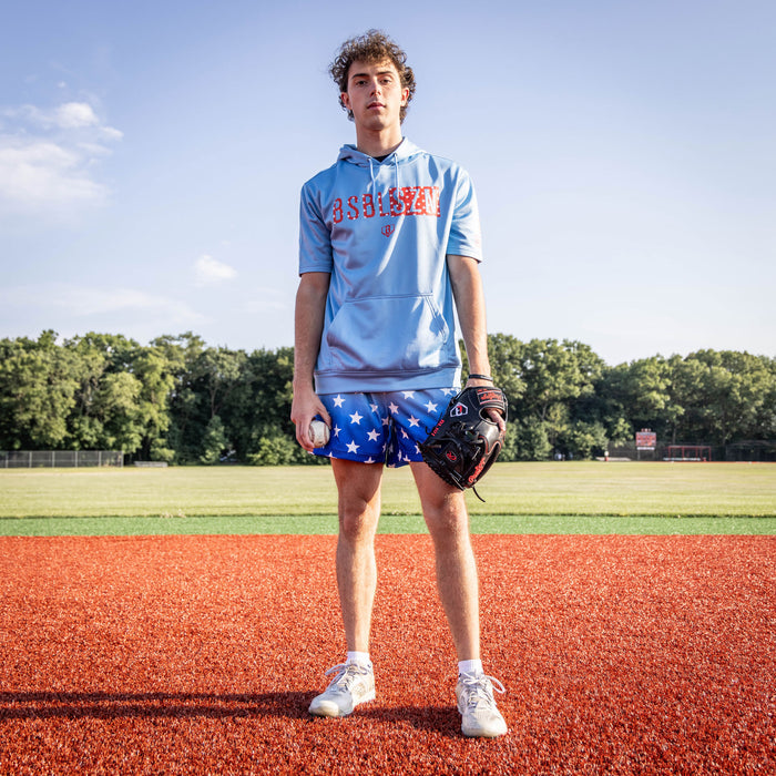 Adult model wearing blue BSBL-SZN Freedom short sleeve hoodie