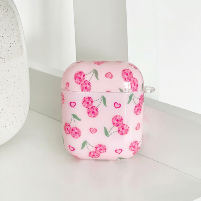 Pink AirPods Case with cherry design, with love hearts.