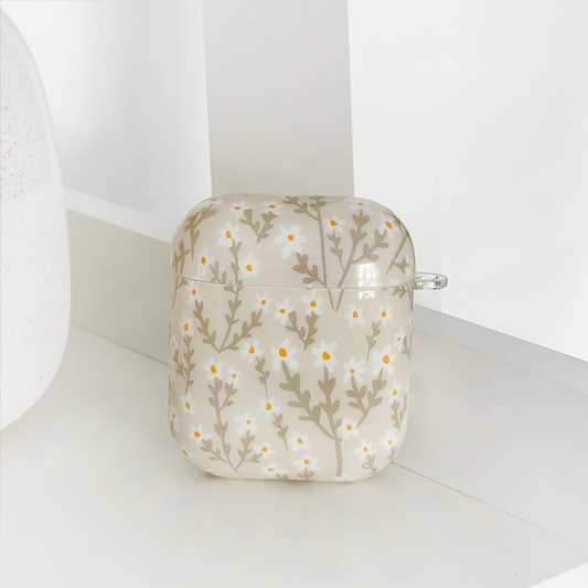 Beige TPU AirPods case with a pattern of white and yellow flowers.