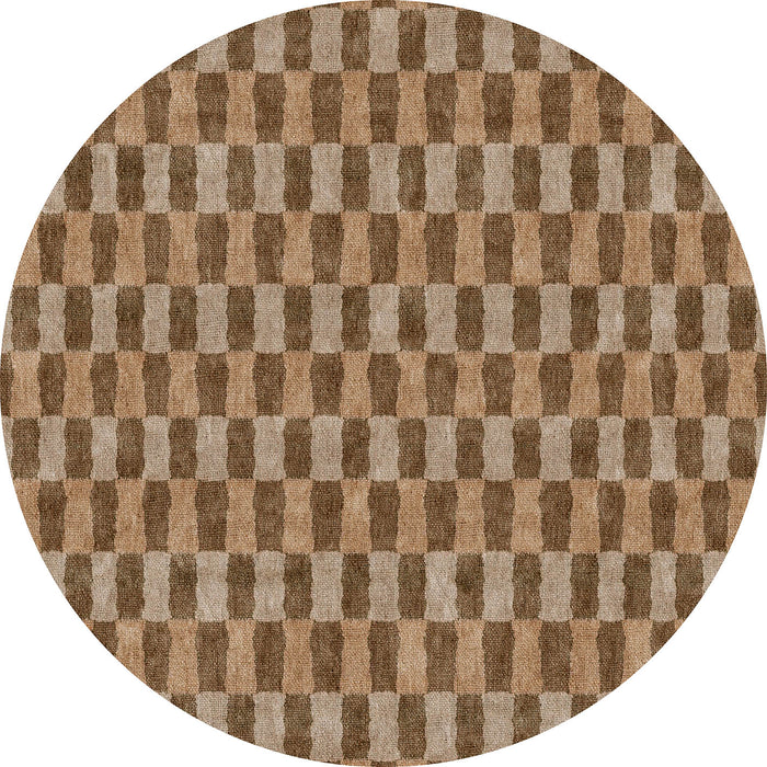 Round rug with a repeating tan and dark brown geometric hourglass tile pattern.