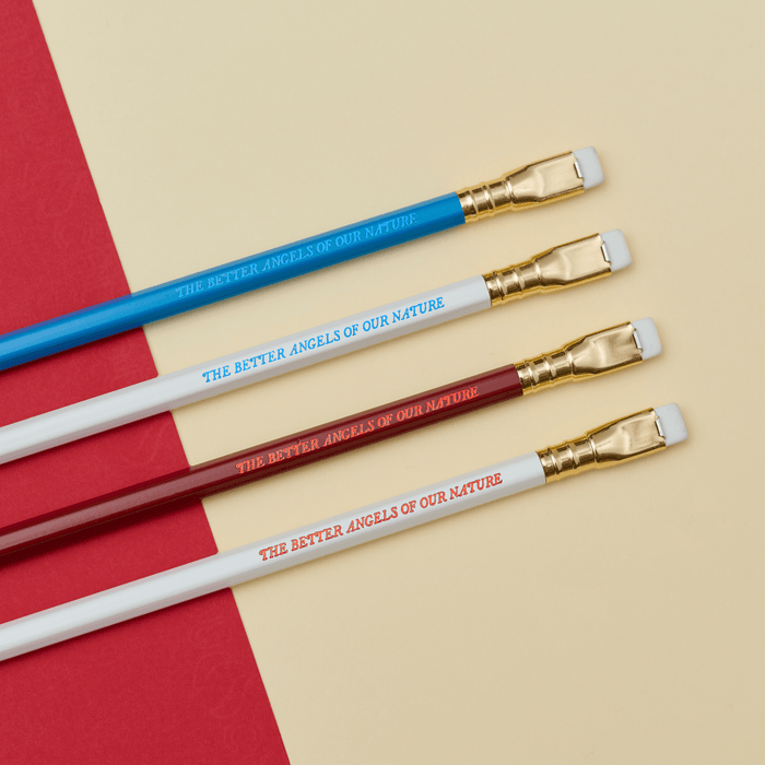 4 variations of Blackwing 250 pencils  with text that says 'THE BETTER ANGELS OF OUR NATURE' on a cream and red background