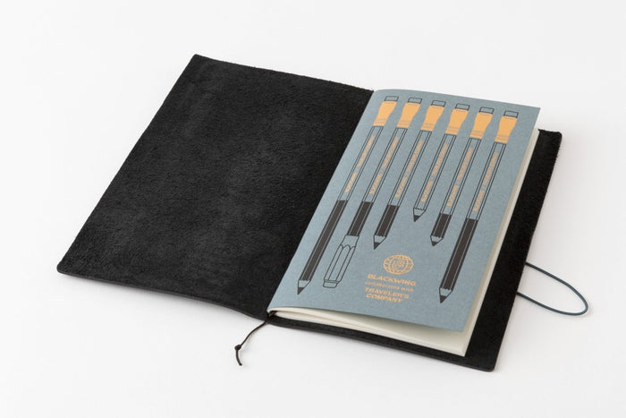Blackwing X TRAVELER'S COMPANY notebook refill featuring a soft blue cover with gold foil pencils imprinted