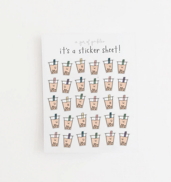 A sticker sheet featuring twenty cute illustrated boba tea cups arranged in five rows on a white background, with the text 'it's a sticker sheet!' printed above them.