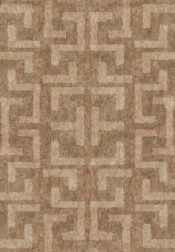 Tan and beige rug featuring a repeating geometric Greek key pattern.