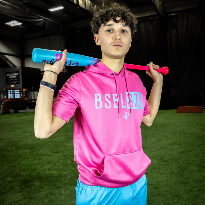 Adult model wearing pink BSBL-SZN Cotton Candy Pink short sleeve hoodie