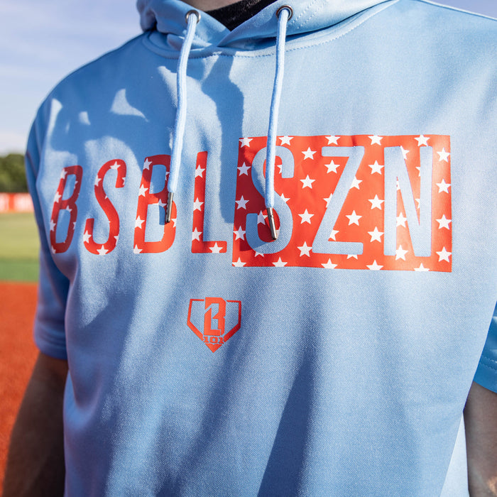 Adult model wearing blue BSBL-SZN Freedom short sleeve hoodie