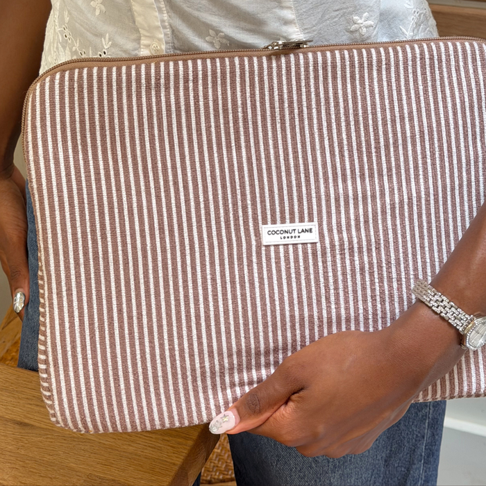 Close up in cafe of Chestnut Stripes Laptop Sleeve