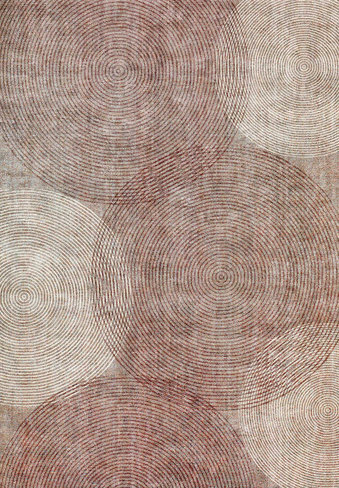 Rust and cream rug featuring an overlapping concentric circle pattern with a textured, distressed finish.