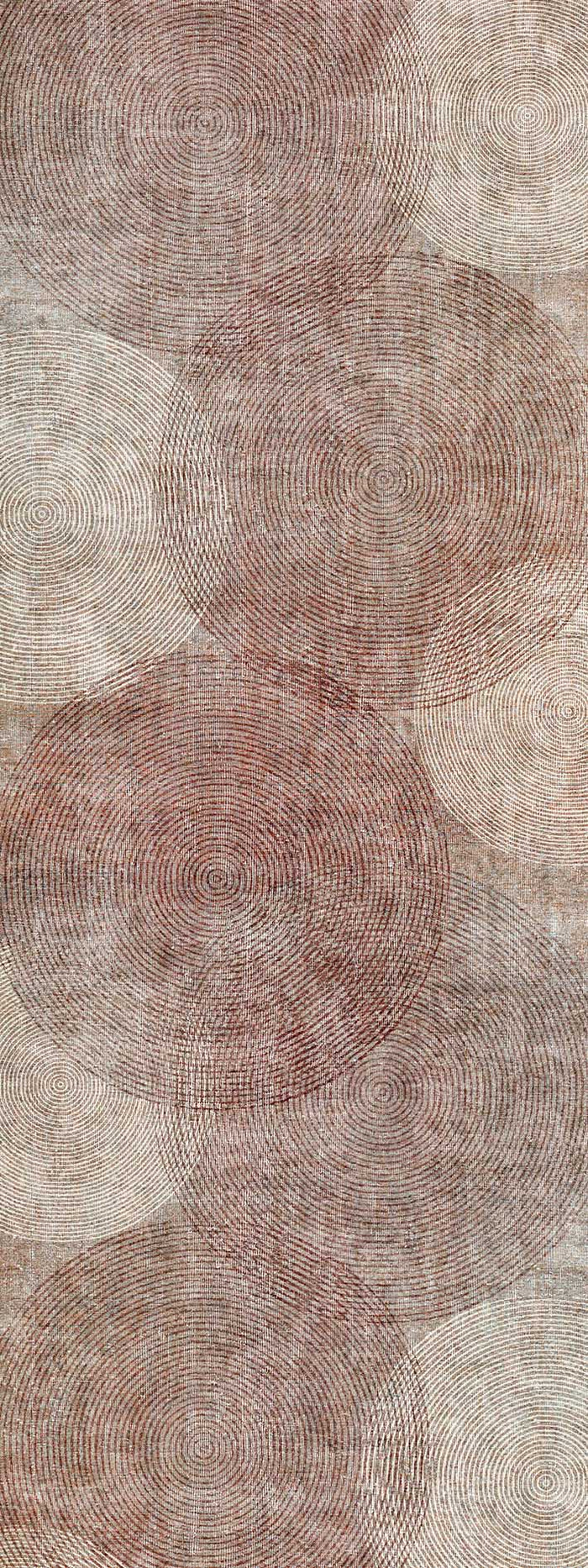 Rust and cream rug featuring an overlapping pattern of concentric circular lines on a textured background.