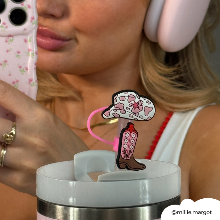 Woman taking selfie with pink phone; her tumbler has a pink Cowgirl Core straw cover from Coconut Lane.