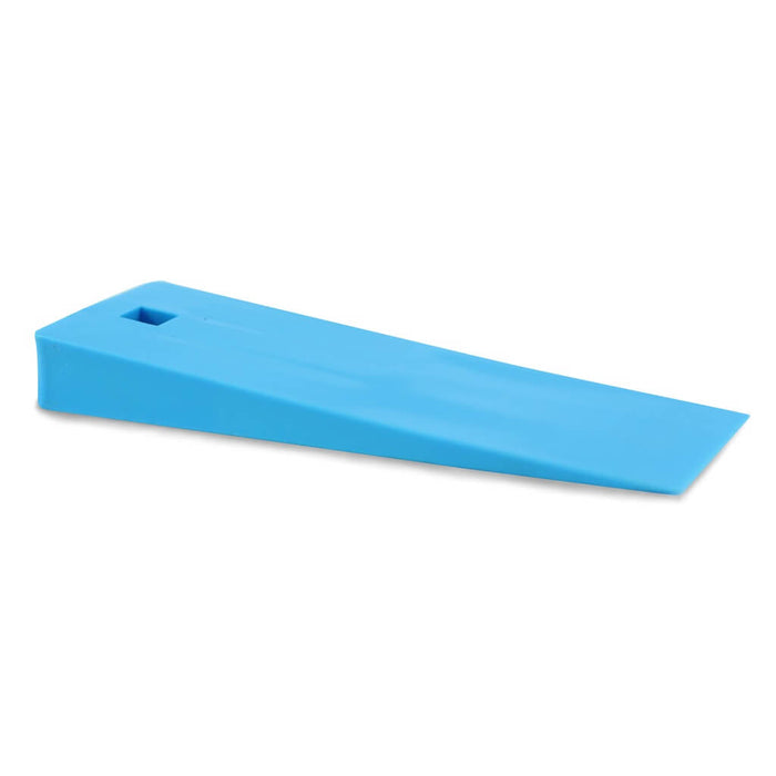 Medium sized blue demolding wedge. Thicker on one side than the other. Includes hanging hole.
