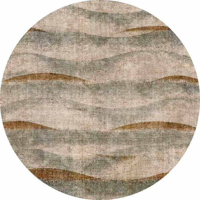 Round rug with a distressed, wavy horizontal stripe pattern in shades of beige, sage green, and copper brown.