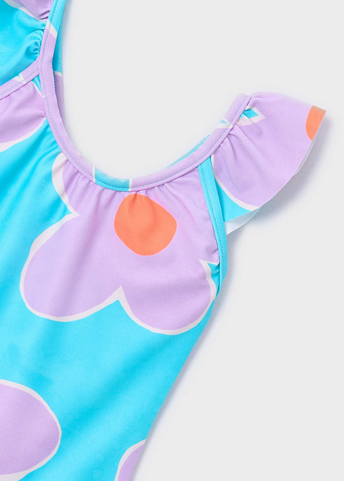 Close-up of Mayoral girls Lilac/Aqua swimsuit with floral print and ruffle detail