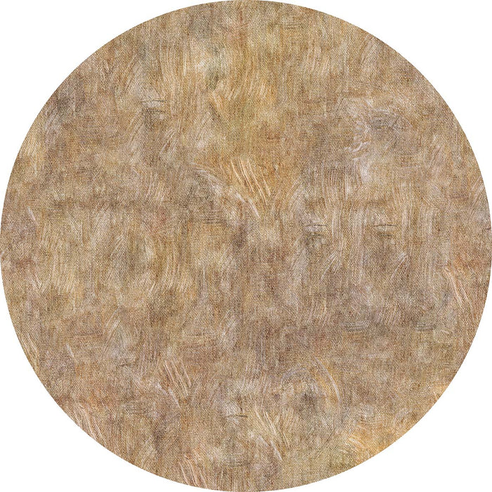 Circular tan and brown rug with a textured, brushstroke-style abstract pattern.