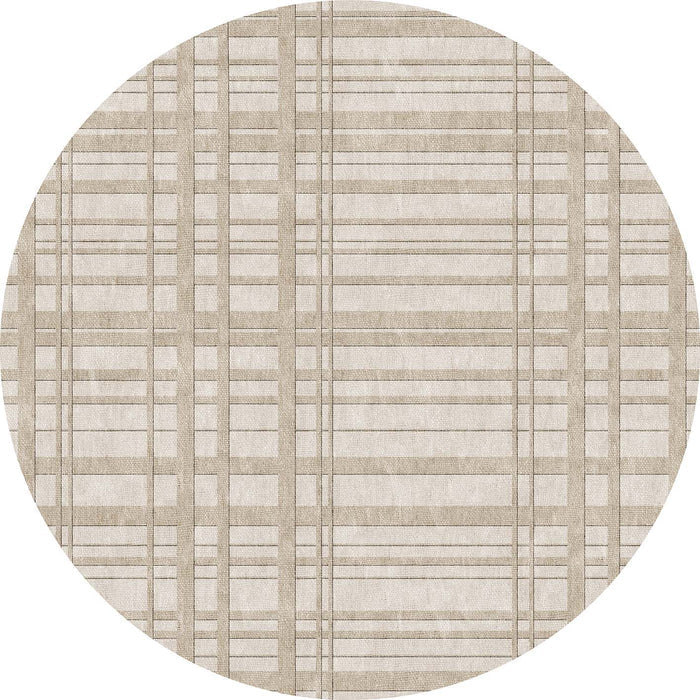 Round beige and cream rug featuring a grid-like plaid pattern of intersecting horizontal and vertical lines.
