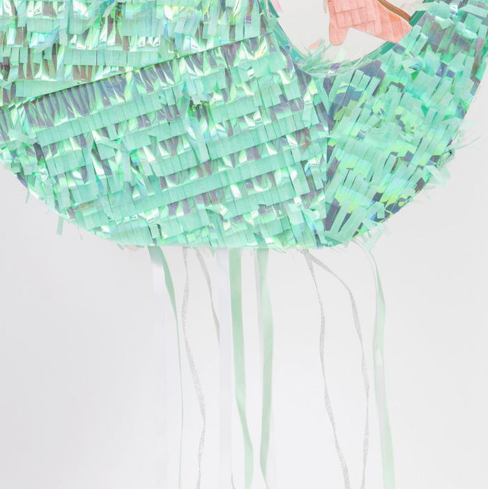 Green layered dress with fringe on a white background