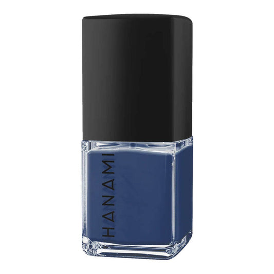 Blue nail polish bottle with black cap on a white background.