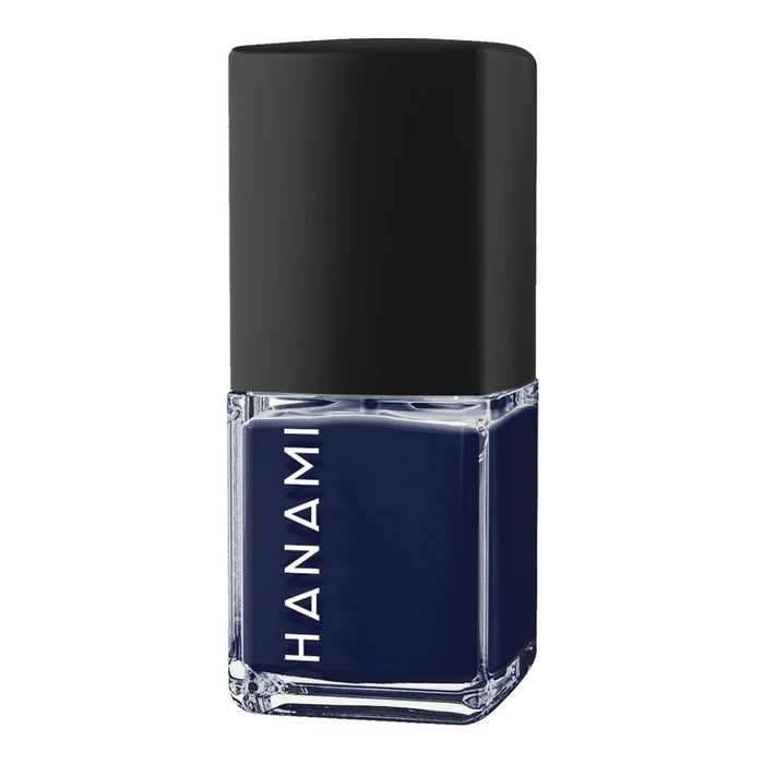 Navy blue nail polish bottle with black cap on a white background.