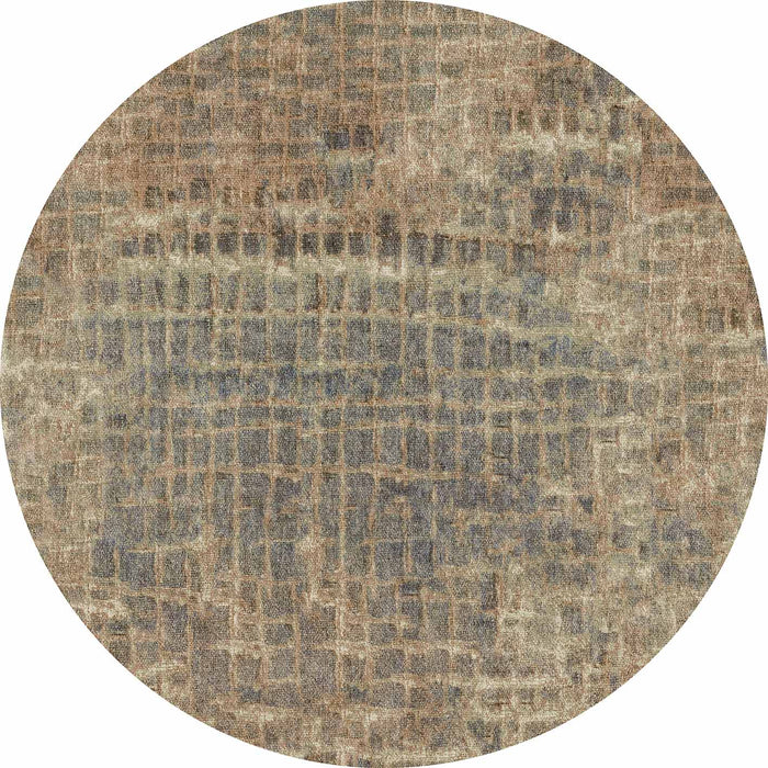 Round rug with a distressed grid pattern in shades of sage green, slate blue, and muted brown.