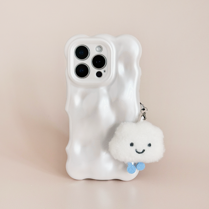 White wavy iPhone case with cloud charm and fluffy smiley face keychain attached.
