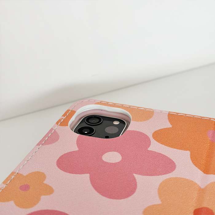 Coconut Lane Pink & Orange Bloom iPad case with bold floral pattern and camera cutout.