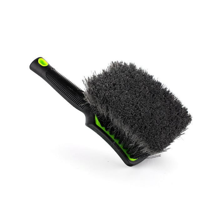 A green Detail Factory Wheel Face Brush on a white background.