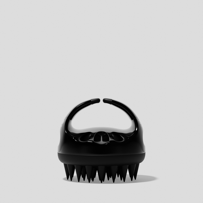 Zenagen scalp massager brush with soft silicone bristles designed to exfoliate the scalp, stimulate circulation, and distribute shampoo evenly.