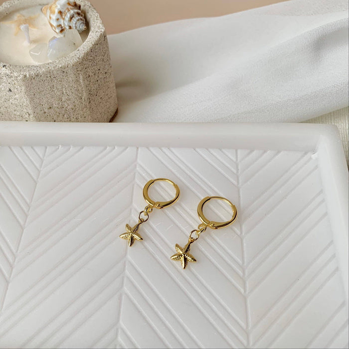 STARFISH HUGGIE HOOPS│14k yellow gold│coastal jewelry