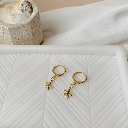 STARFISH HUGGIE HOOPS│14k yellow gold│coastal jewelry