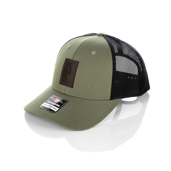 A green TRC hat on a white background.