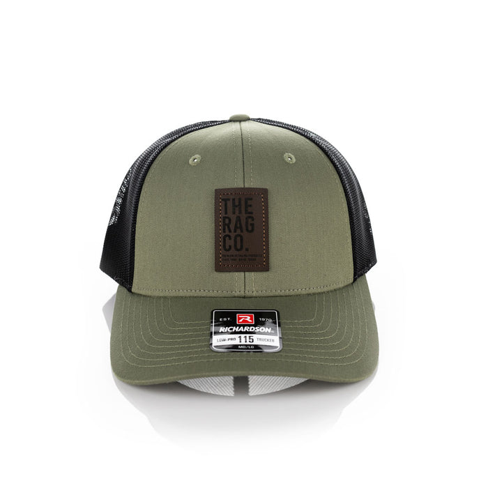 A green TRC hat on a white background.
