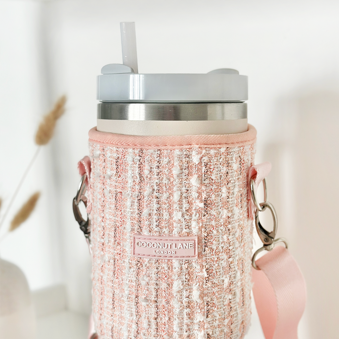 Pink tweed Coconut Lane tumbler carry case with a strap, designed to fit a tumbler.