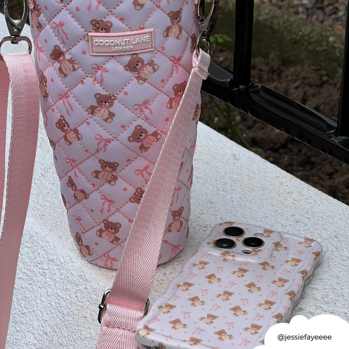 Quilted tumbler carry case and phone case with teddy bear and bow print, from Coconut Lane.