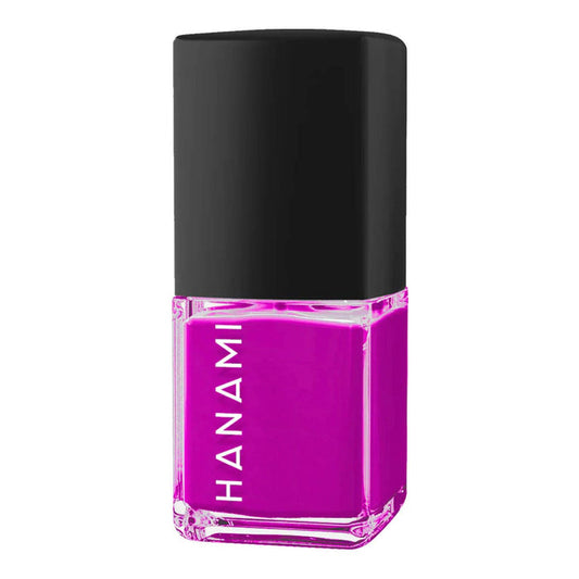 Pink nail polish bottle with black cap on a white background.